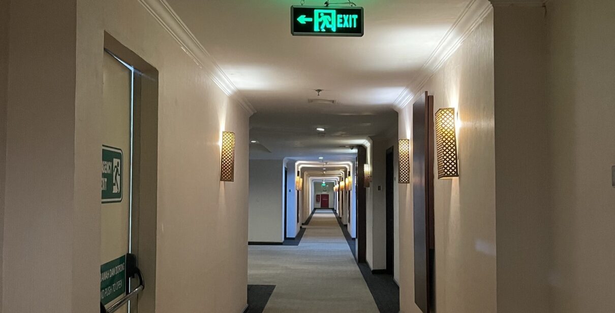 Hotel Corridor with Fire Safety Doors and Emergency Lighting